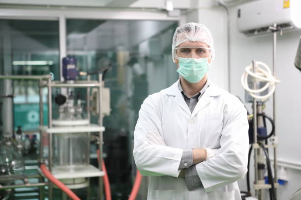 istock scientist  analyzing a biological and ecological hemp plant used for herbal pharmaceutical CBD oil and THC oil in a laboratory. 1410531065