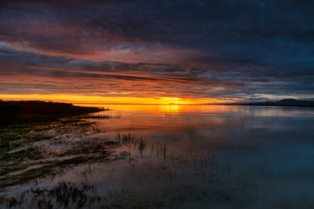 istock sunset glow view at the estuary where river meets sea 1410532597
