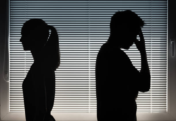 istock Man and woman ignore each other back facing away from each other. Relationship problems. 1410532610