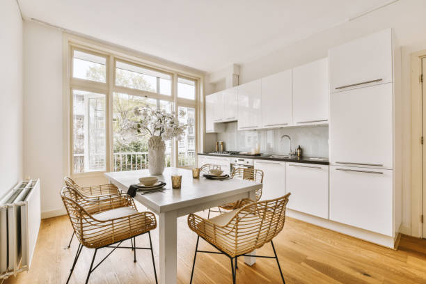 istock An open-style apartment with a dining area and a small kitchen 1410533563