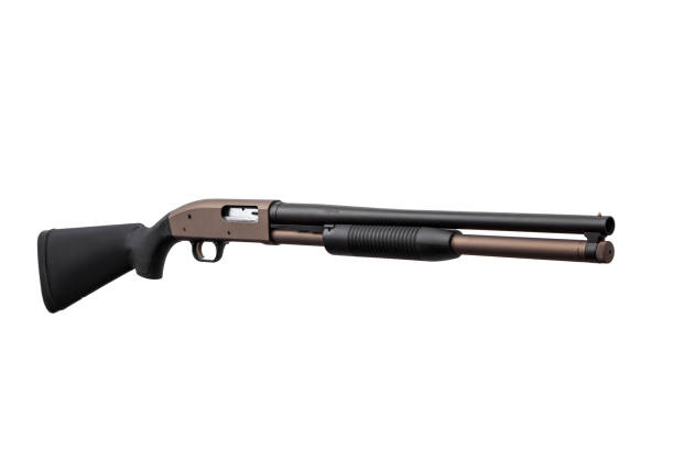 istock Pump-action 12 gauge shotgun isolated on a white background. A smooth-bore weapon with a plastic stock. 1410535952