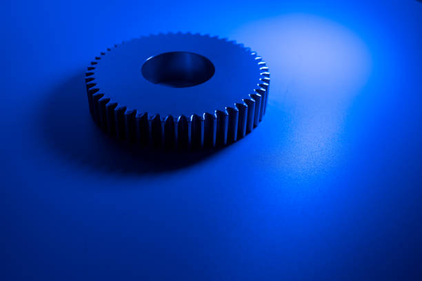 Metal gears on a blue background