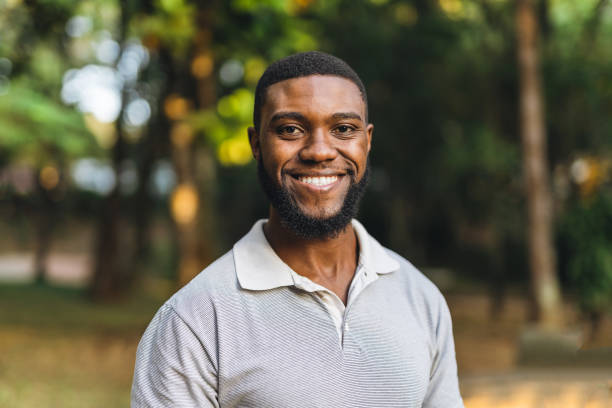 Young Man In The Public Park Stock Photo - Download Image Now - People,  Smiling, One Person - iStock