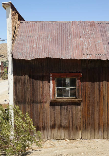 istock Abandoned old building with rusty metal roof 1410539439