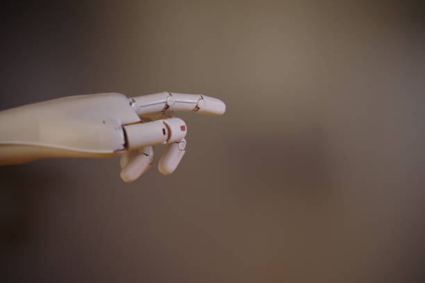istock Close up of robot hand 1410542806