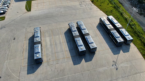 Fleet of trucks positioned in a studio environment
