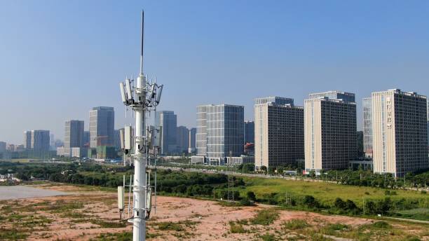 istock 5G communication base station outside the office building 1410545598