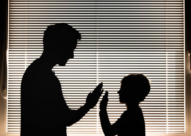istock Parent encouraging child with a high five. 1410545798