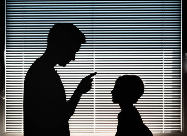 Father disciplining his child. stock photo
