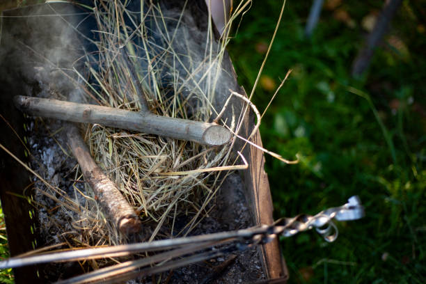 istock Bonfire in nature. Dry branches are burning. Burning firewood. Flames from coals. 1410545886