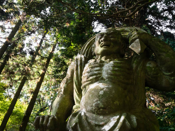 Stone guardian statue at Futagoji Buddhist temple on Kunisaki peninsula - Oita prefecture, Japan stock photo