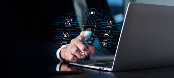 istock To access a private system. Biometric fingerprint scanning provides safe access to a secured data network. On a laptop computer, a person is employing finger print authentication technology. 1410552477
