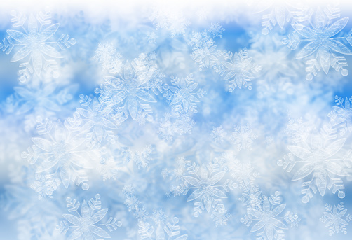 Digitally created image of Abstract blue snowflakes  background