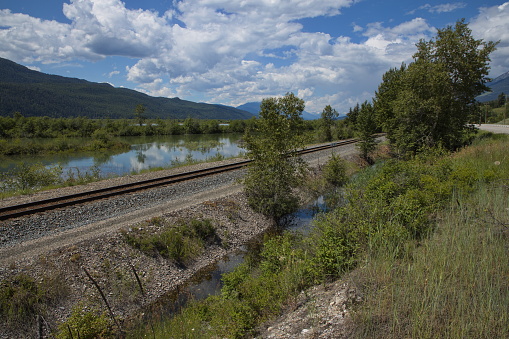 Railway along Columbia River at Spillimacheen in British Columbia,Canada,North America