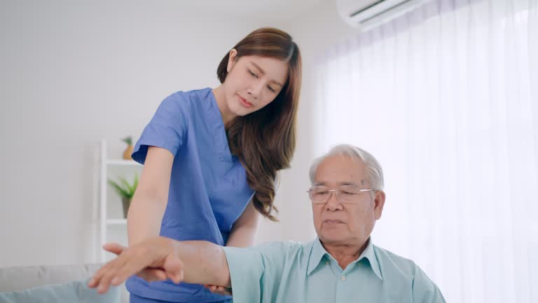 Asian senior male and female health consulting with doctor via laptop online.medical consuling concept.Using computer video call distance web cam.