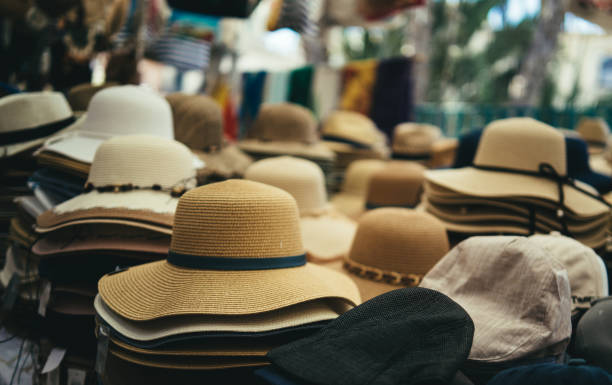istock Straw hats on market stalls 1410563390