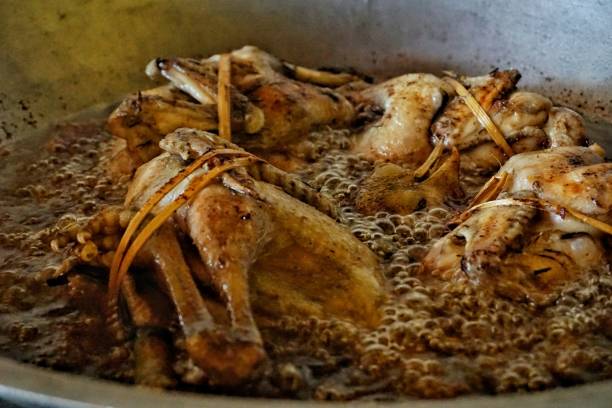 istock chicken fried in hot oil 1410571513