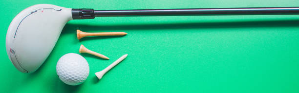 istock Golf equipment flat lay on green background. Top view. web banner size. 1410573085