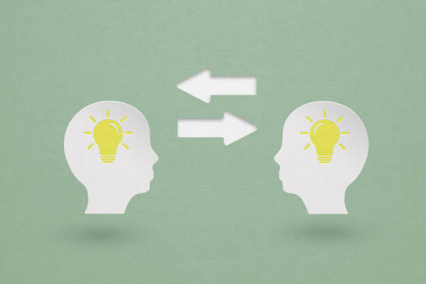 istock white head with bright lightbulb and arrow paper cut on grunge green texture background for transferring knowledge, technology and brainstorming concept 1410574956
