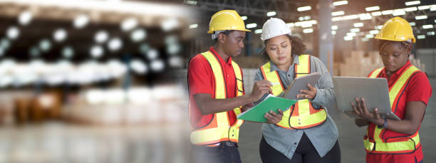 istock Group of foreman or engineer working in the warehouse. 1410576981