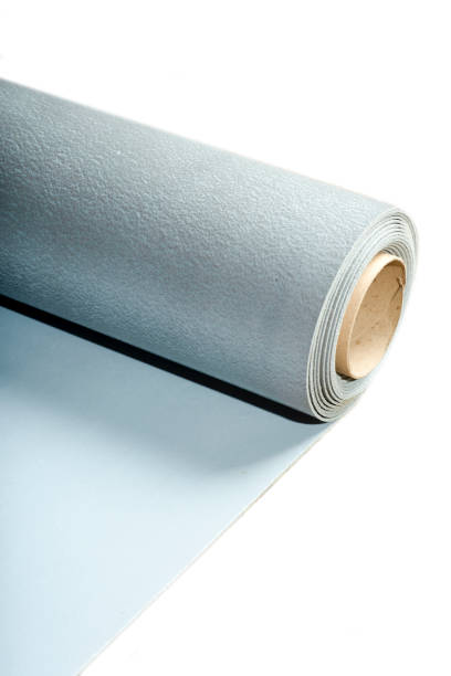 istock Laminate underlay with adhesive surface. Protective layer for wood flooring. 1410582054