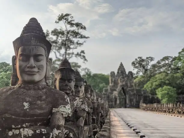 The smiling face of Devas (god) at the southern gate of Angkor Thom.