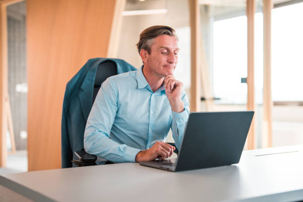 istock Handsome Businessman Doing The Strategic Planning For An International Client 1410588841
