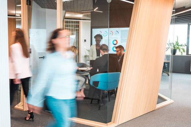 istock Marketing Team In A Meeting With A Client 1410589119