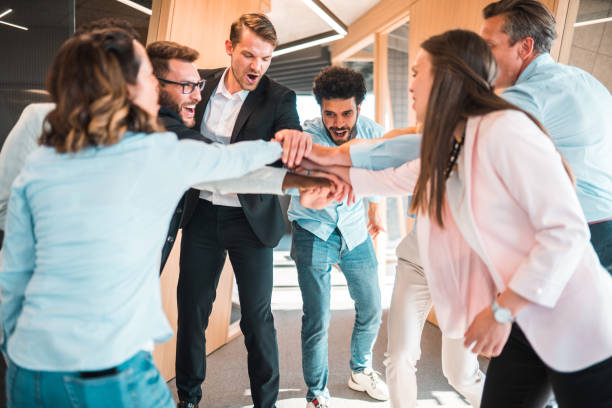 istock Multiracial Human Resources Team Celebrating Teamwork And Success 1410589144