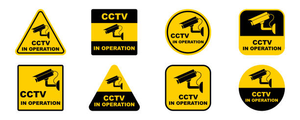 Set with cctv camera signs. Video surveillance. Camera in operation. Warning on Video observation. Set with cctv camera signs. Video surveillance. Camera in operation. Warning on Video observation. Yellow stickers. surveillance camera sign stock illustrations