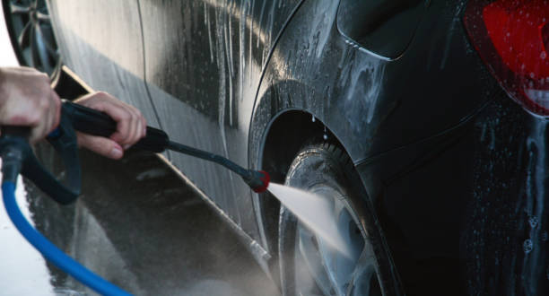 istock washing a car with water pressure 1410593527