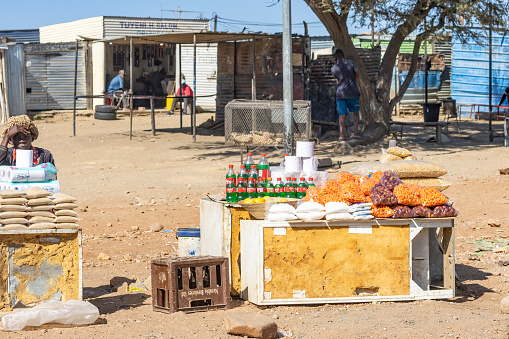 A woman selling various goods at a Street Market at Katutura Township near Windhoek in Khomas Region, Namibia