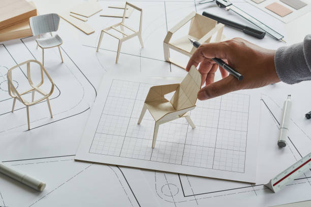 istock Designer sketching drawing design development product plan draft chair armchair Wingback Interior furniture prototype manufacturing production. designer studio concept . 1410598173
