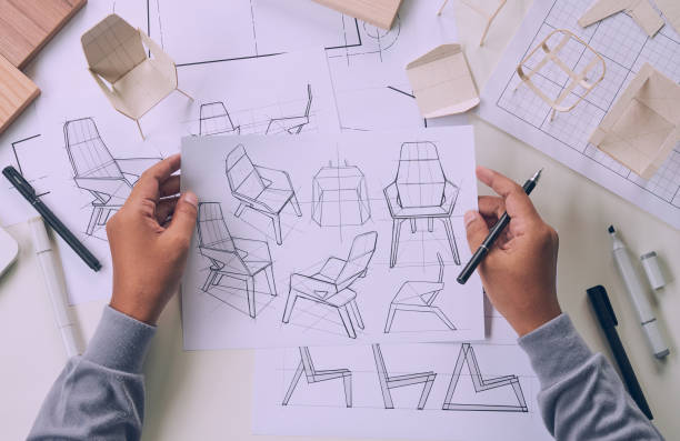 istock Designer sketching drawing design development product plan draft chair armchair Wingback Interior furniture prototype manufacturing production. designer studio concept . 1410598176