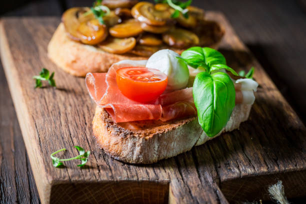 istock Crisp and hot various bruschetta as classic snack for breakfast. 1410599165