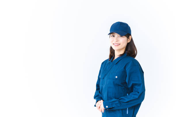 istock Young woman working in work clothes with a smile on her face 1410601905