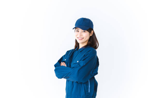 istock Young woman working in work clothes with a smile on her face 1410601911