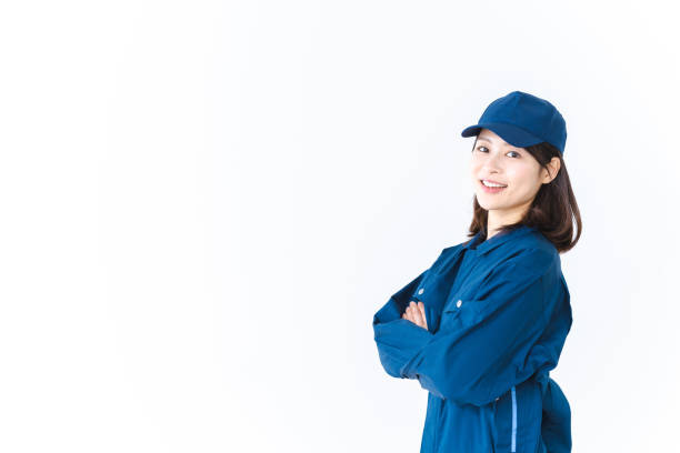 istock Young woman working in work clothes with a smile on her face 1410601922