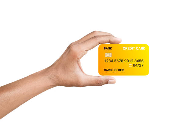 istock hand hold yellow credit card 1410602126