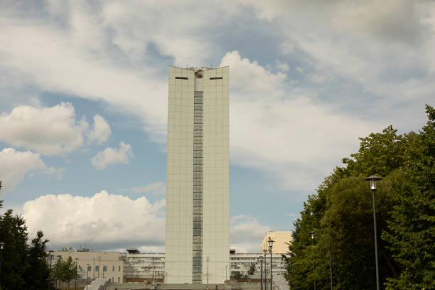 A building in the city. Urban development. Multi-storey house. Building in the area.