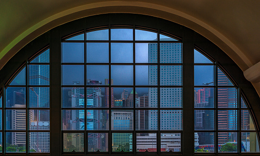 Looking through the window at the high-rise buildings in Central, Hong Kong.