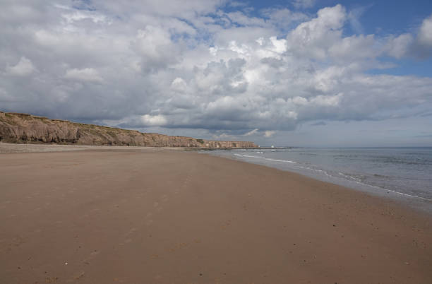 istock A delightful view along the empty sandy beach at Seaham, County Durham, UK. 1410607310