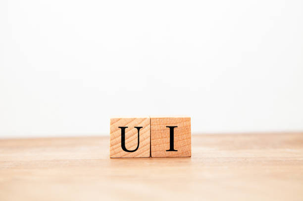 istock UI. User interface. UI characters drawn on a wooden block. 1410611499
