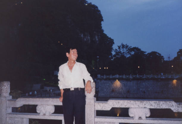 istock 1990s Chinese Men Real Life Old Photo 1410614320