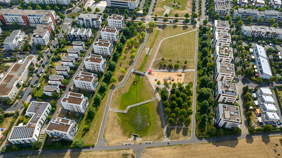 Aerial view to highest ukrainian flag in flagpole on embankment of Lopan river in Kharkiv, Ukraine