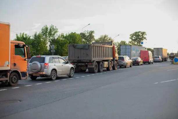 Photo of Traffic jam. Cars are queuing up.