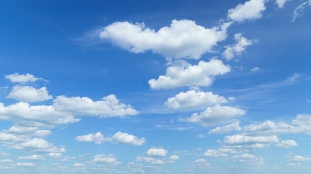 istock beautiful blue sky with clouds on bright sunny day for abstract background 1410618311