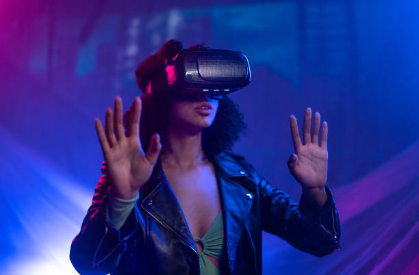 istock Metaverse digital cyber world technology, woman with virtual reality VR goggles playing augmented reality game, futuristic lifestyle 1410621383