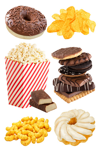 Trans fats in cake, cookies, popcorn and chips  isolated on white background