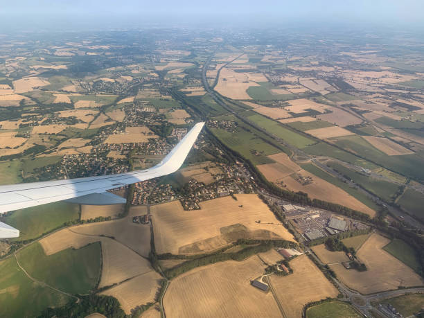 istock Airplane Window View on Earth 13 1410622974